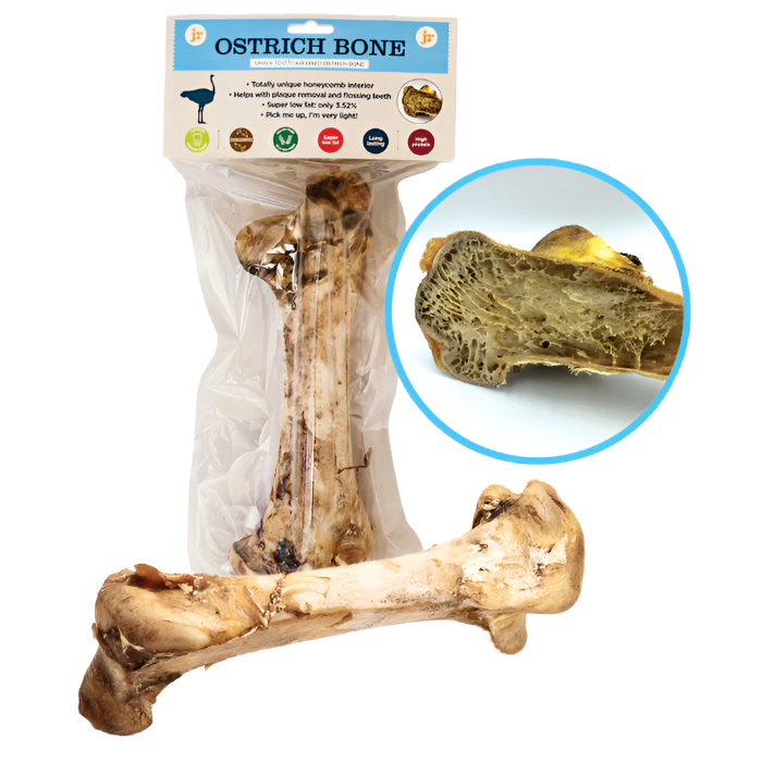 Ostrich bone with packaging and close-up on a white background